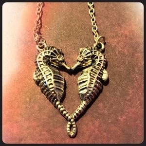 Double seahorse necklace